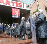 Turkish police force ousted opposition  out of headquarters as crisis deepens